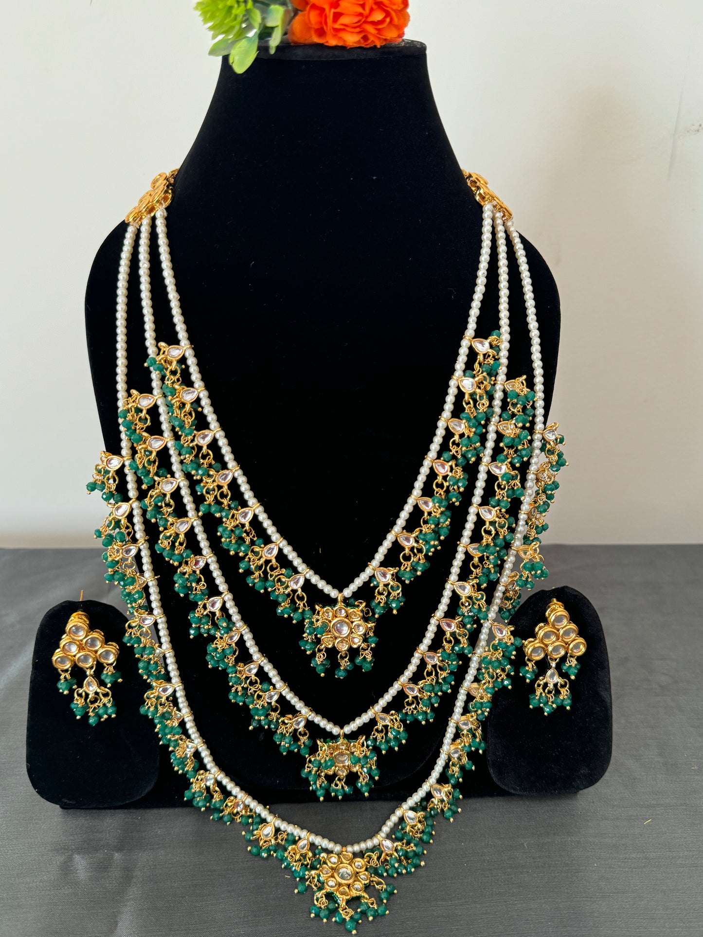 triple-layers kundan with green and white pearl beads long necklace set with earrings