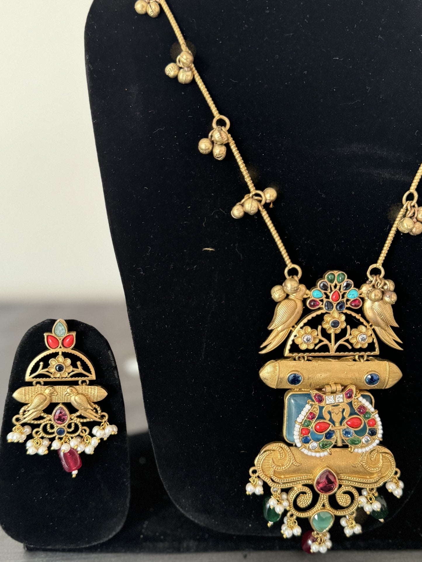 navratan stones with white beads handcrafted golden pendant in long chain with earrings