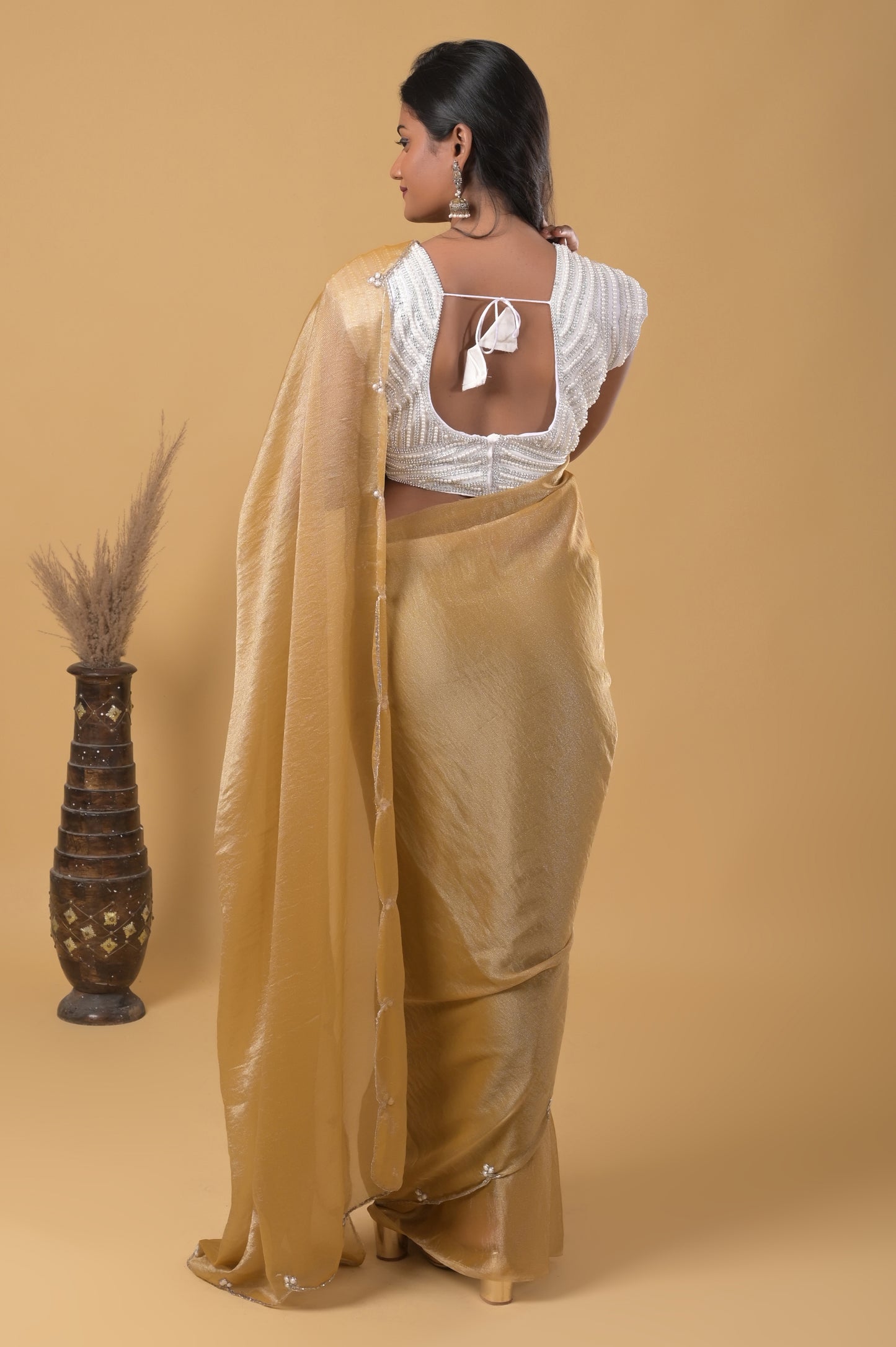 golden pearl embellished mario silk saree with ready-made pearl blouse