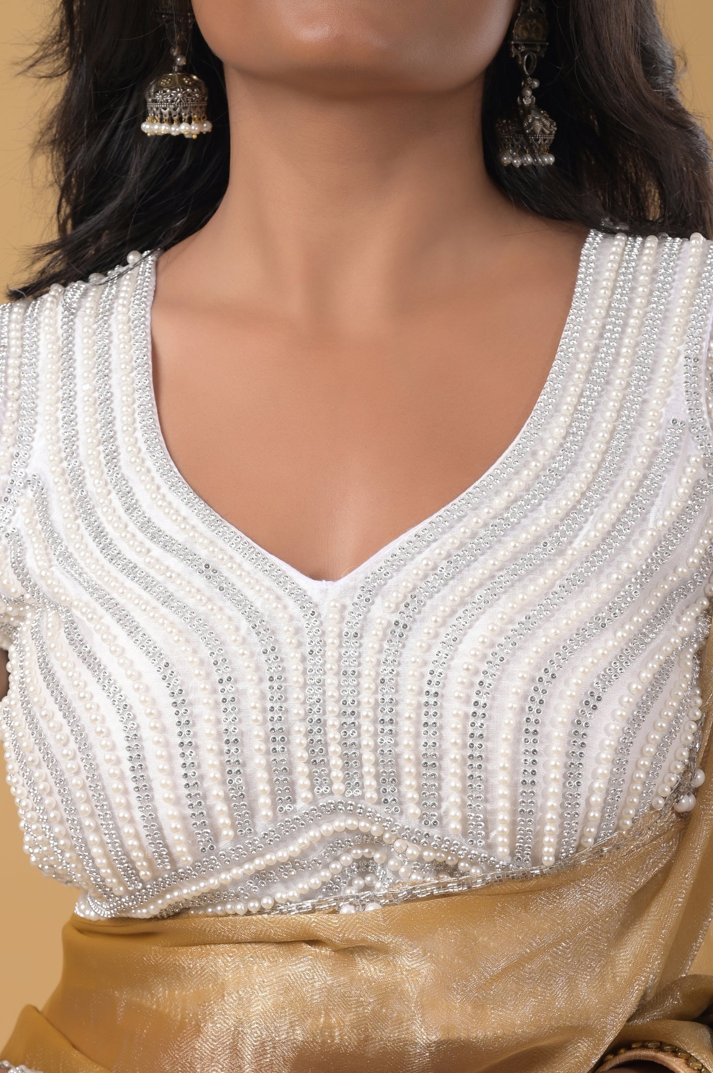 golden pearl embellished mario silk saree with ready-made pearl blouse
