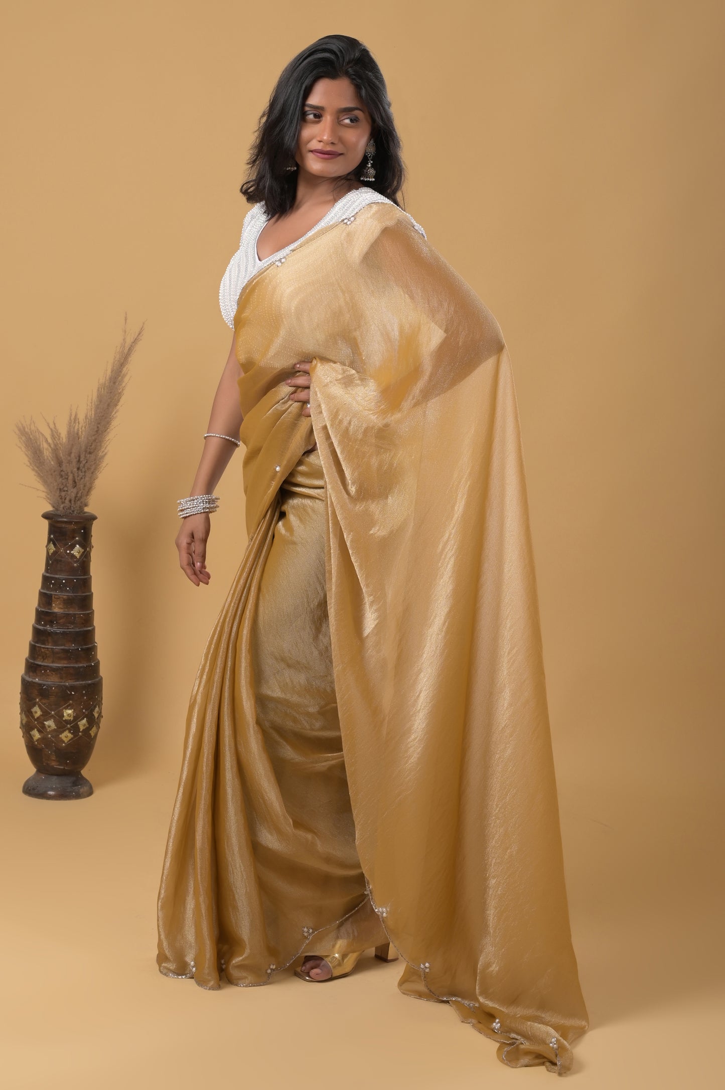 golden pearl embellished mario silk saree with ready-made pearl blouse