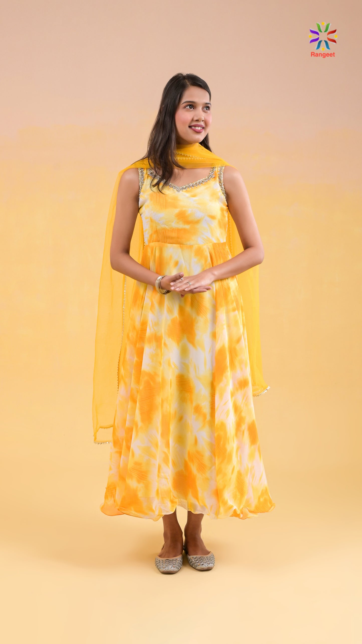 yellow and white tie-dye print georgette gown with net dupatta