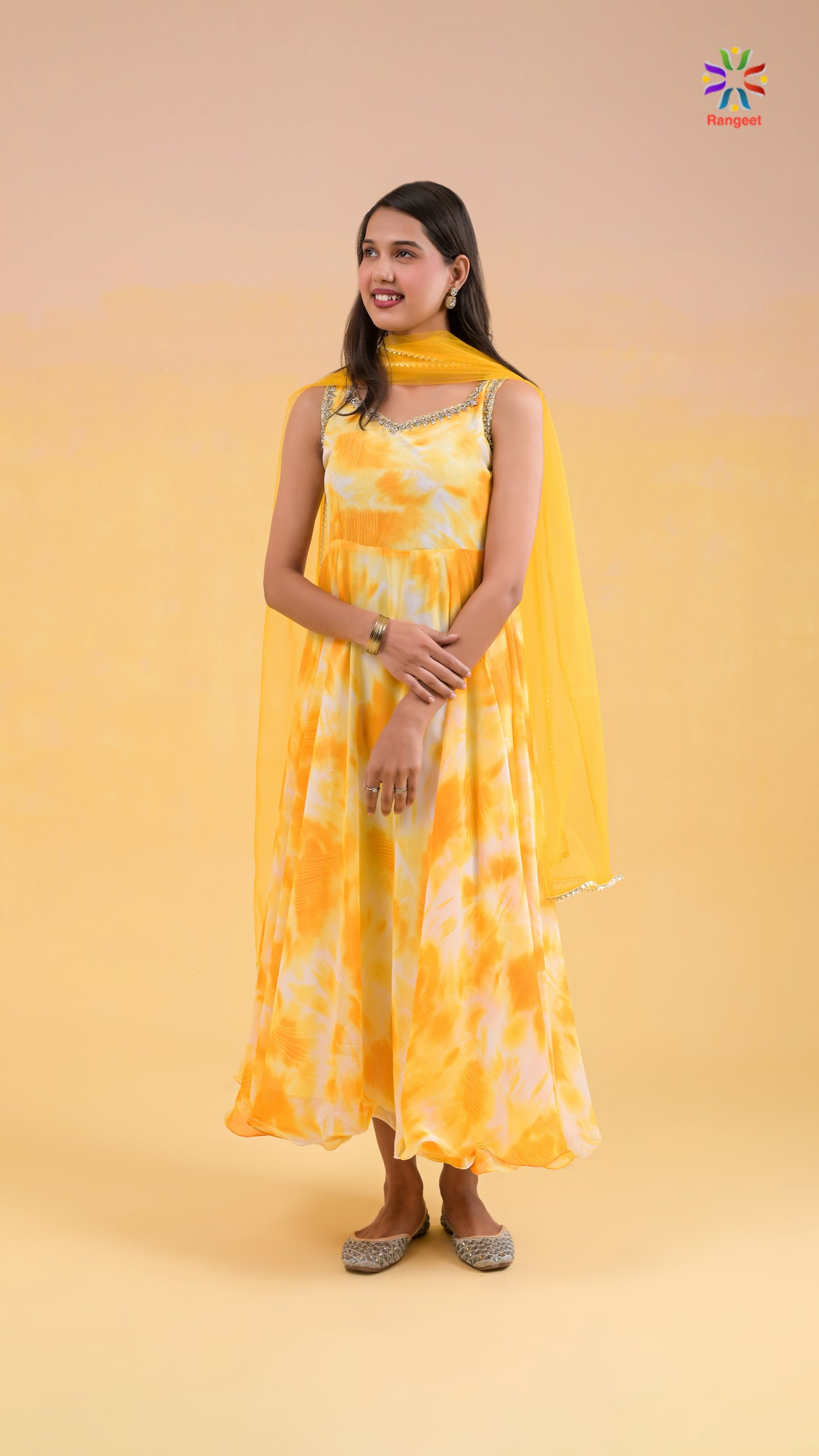 yellow and white tie-dye print georgette gown with net dupatta