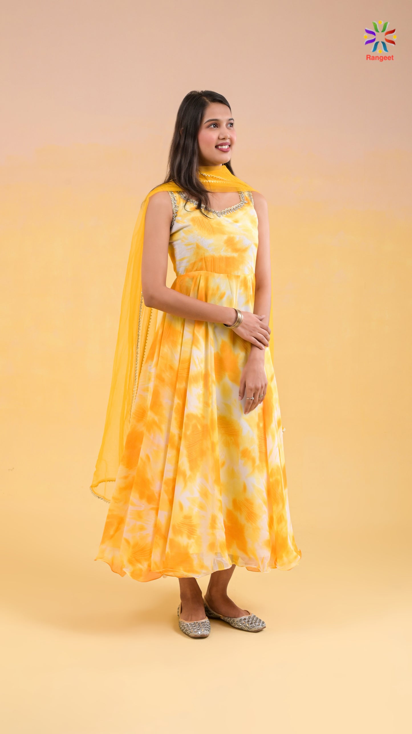 yellow and white tie-dye print georgette gown with net dupatta