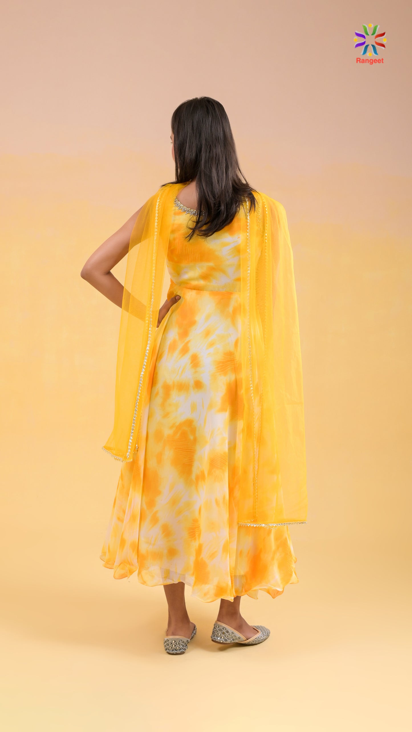 yellow and white tie-dye print georgette gown with net dupatta