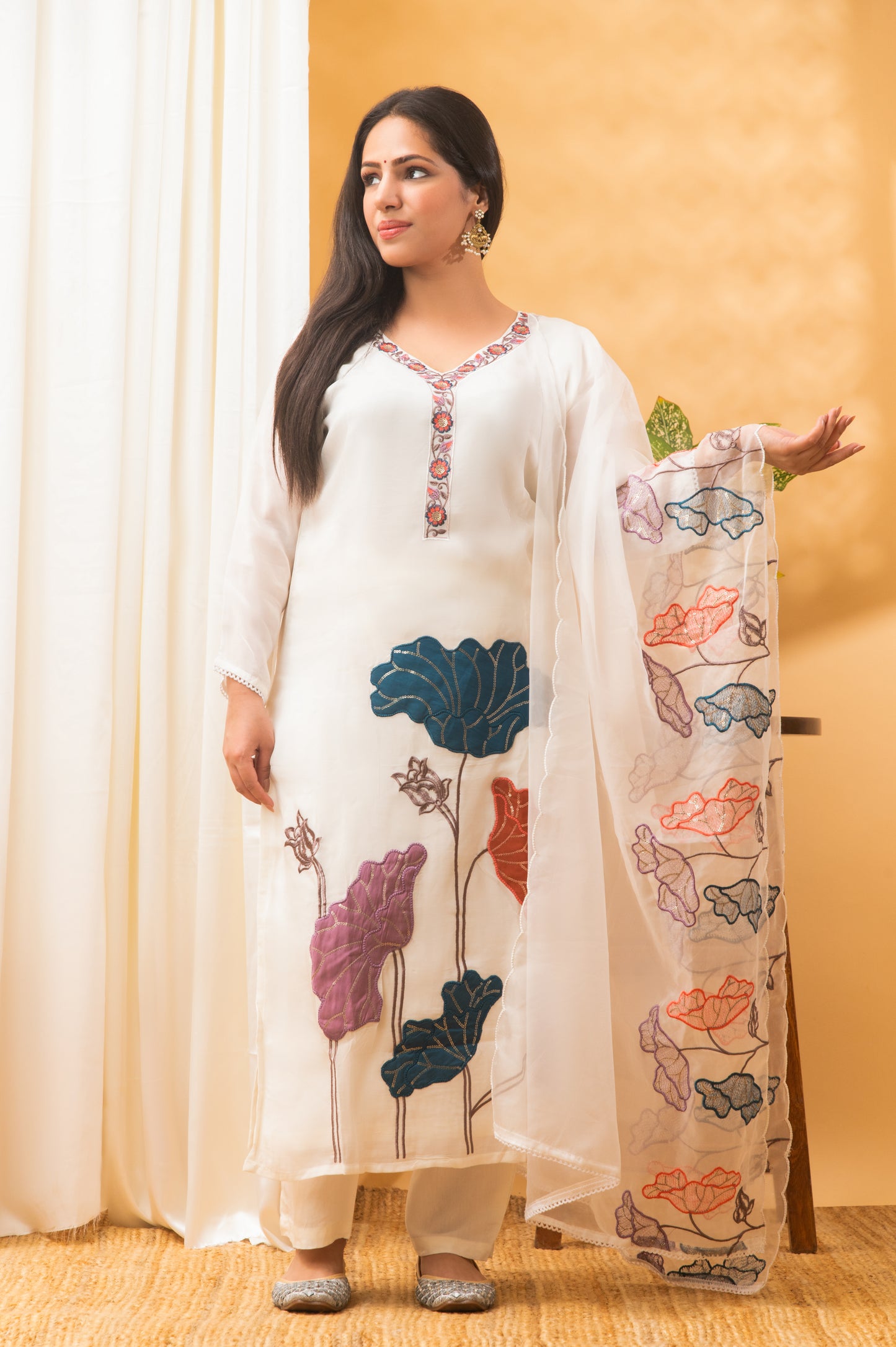 white with multicolour floral embroidery georgette suit