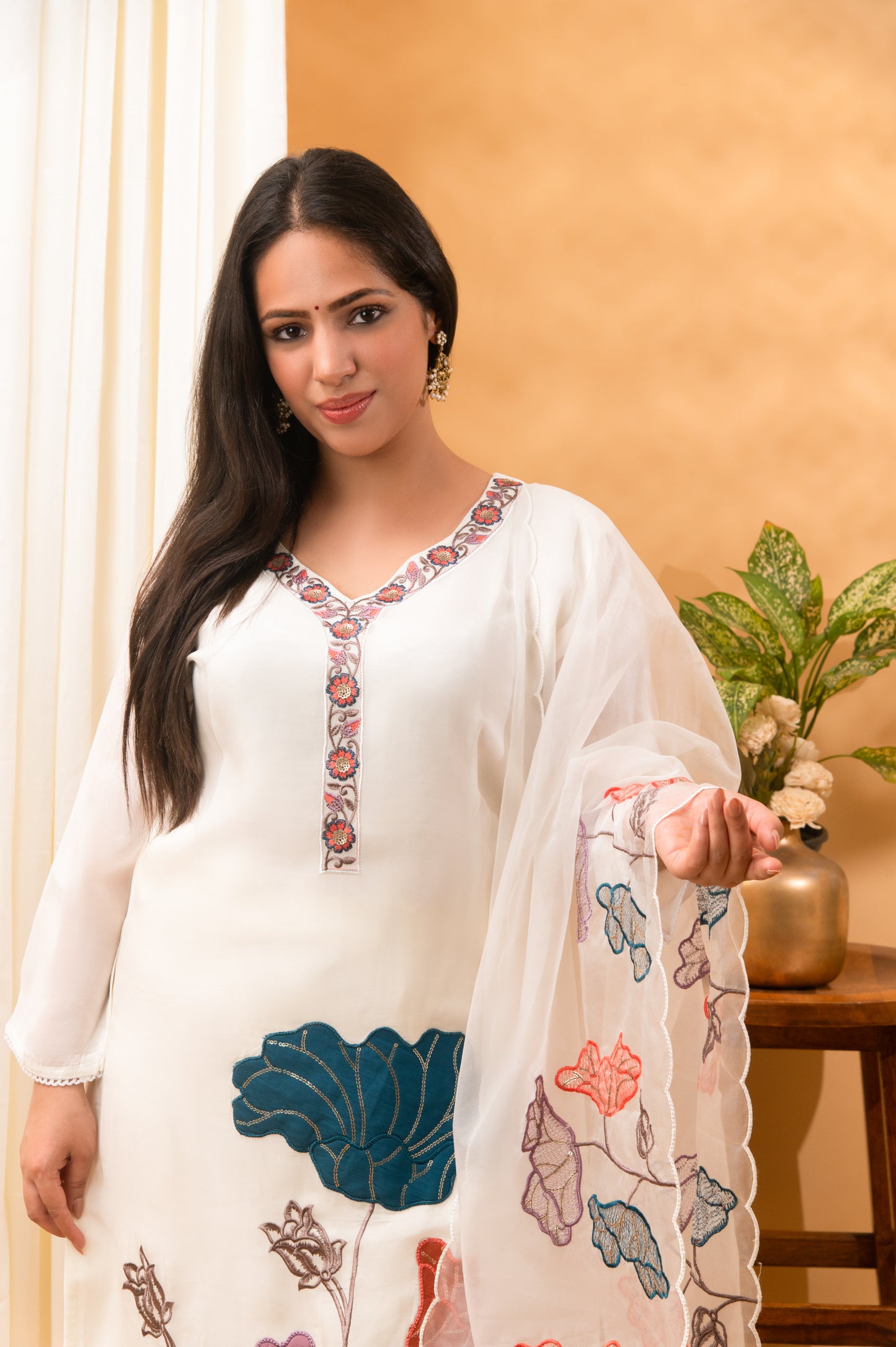 white with multicolour floral embroidery georgette suit