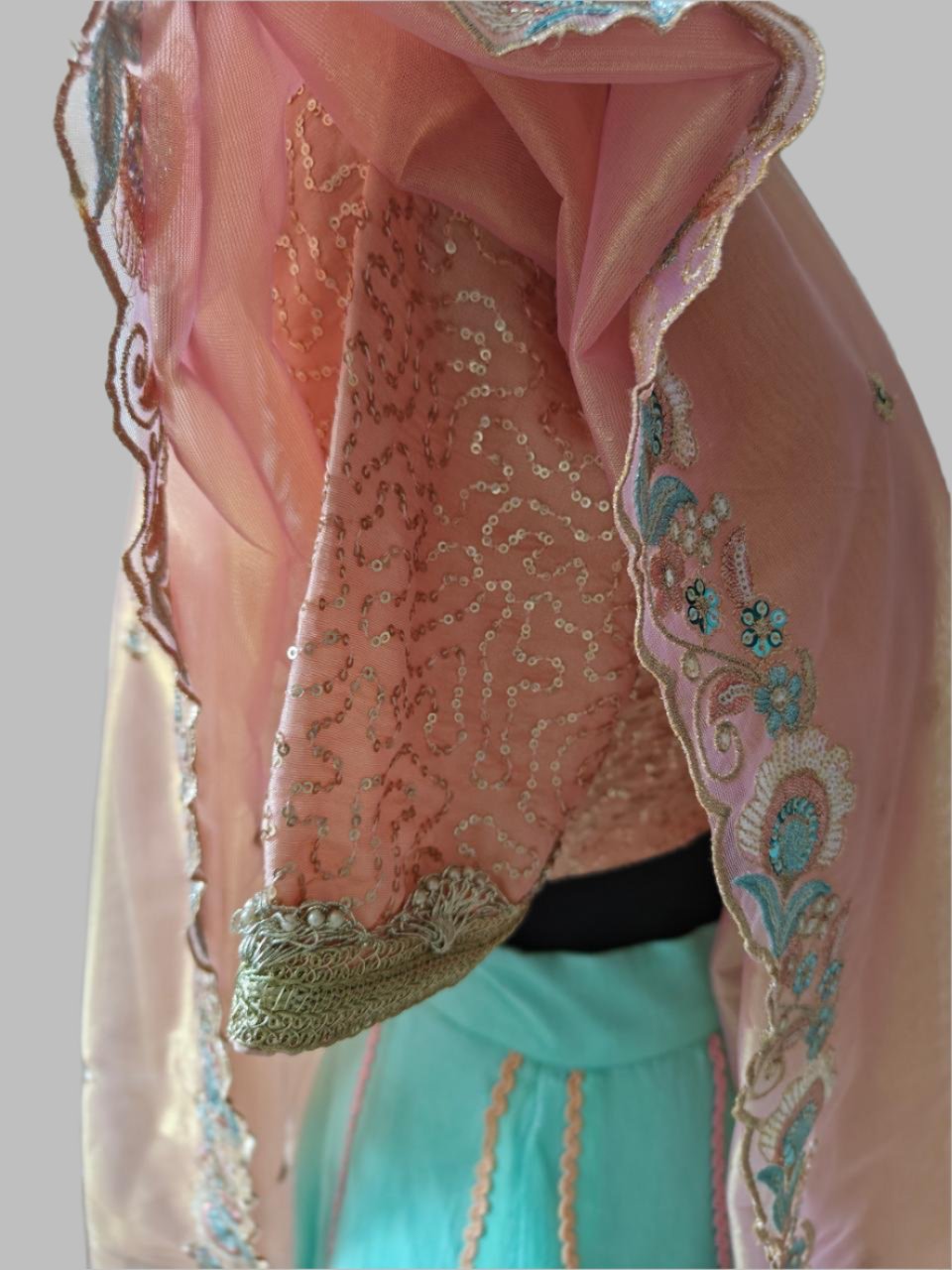 powder blue lehnga with peachish pink blouse and dupatta