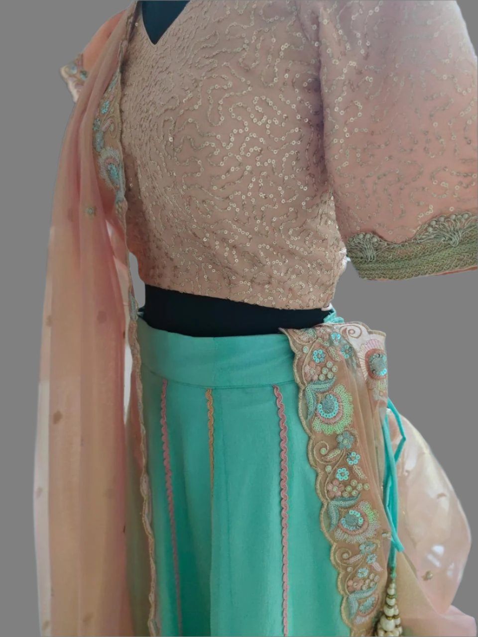 powder blue lehnga with peachish pink blouse and dupatta