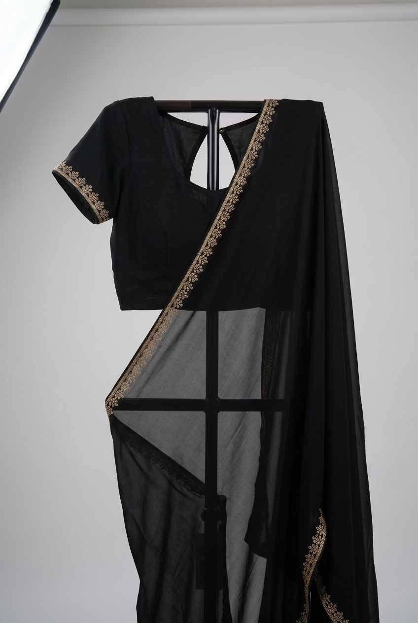 luxurious black satin silk saree with embellished stitched blouse and petticoat