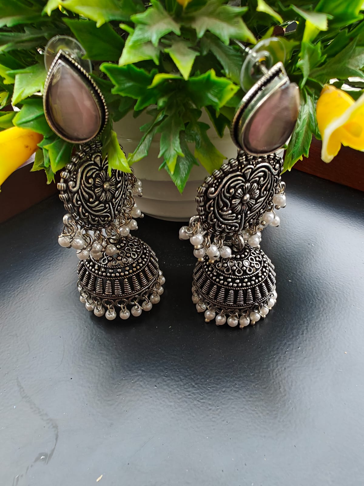 silver toned handcrafted jhumki style long earrings